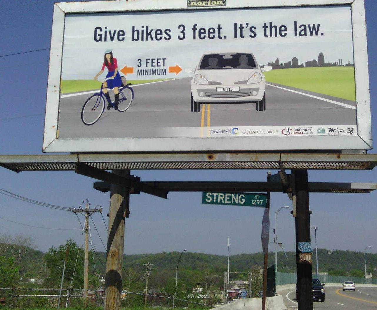 Photo: A billboard in Cincinnati where “3 feet” is the law. 